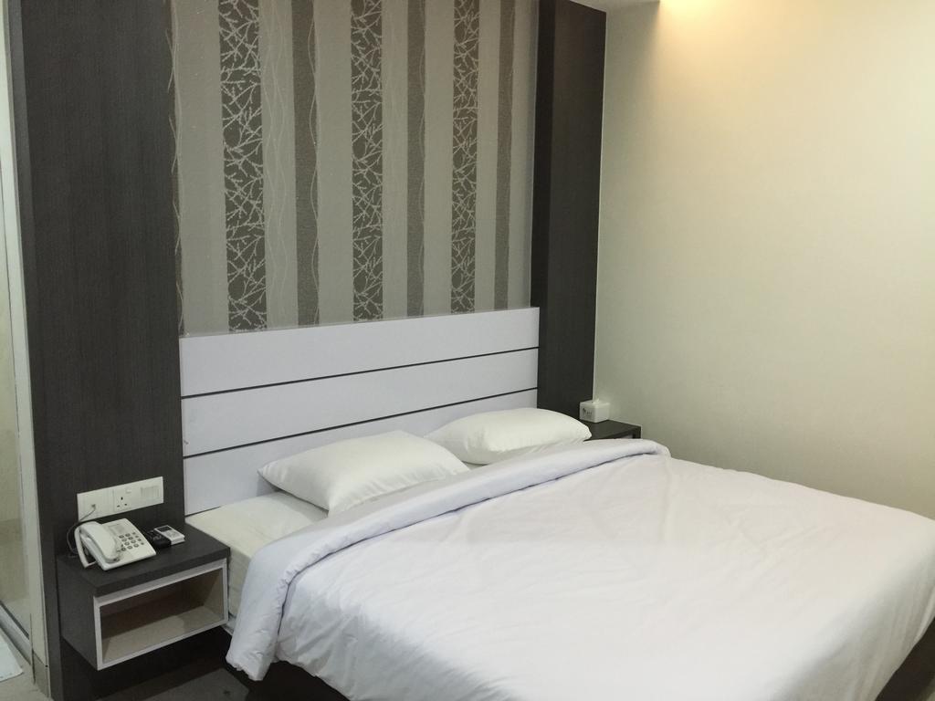 Redlink Hotel Batam Habitación foto