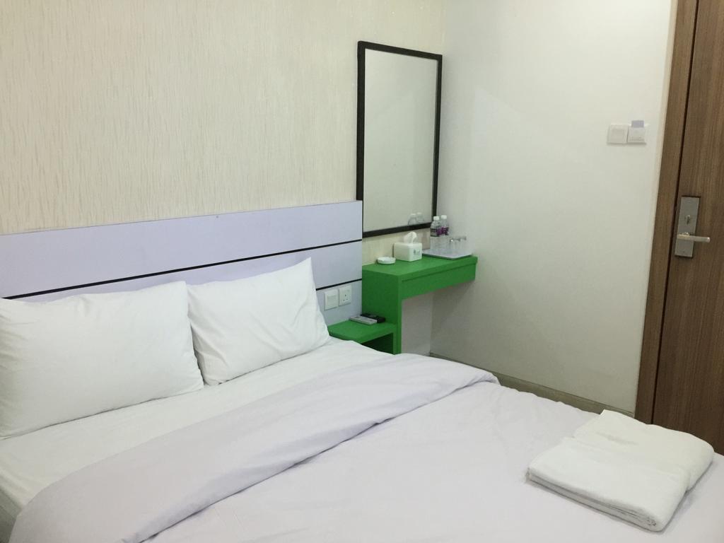 Redlink Hotel Batam Habitación foto