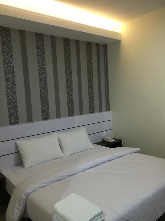 Redlink Hotel Batam Habitación foto